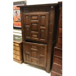 An early 18th Century Continental oak two door cupboard with panelled doors,