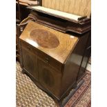 An Edwardian bureau bookcase with inlaid decoration