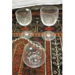A set of five Baccarat Crystal red wines together with a set of four Tiffany & Co stemless brandy
