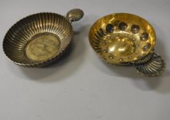 A 19th Century French silver tastevin (by Tétard Frères of Paris), together with another, 3.