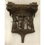 A Burmese teak domestic Buddha bracket/stand with figural and carved decoration,