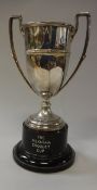 An Edward VIII silver trophy cup of faceted form raised on a circular foot (Chester 1936) 8.