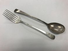 A pair of Georgian silver "Old English" pattern serving spoon and fork (maker's mark rubbed,