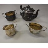 A composite silver teaset of teapot,