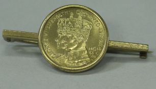 A George VI and Elizabeth Coronation coin,