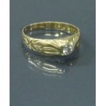 An 18 carat gold solitaire gents ring 4.
