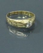 An 18 carat gold solitaire gents ring 4.