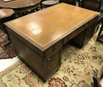 A 19th Century mahogany kneehole desk,