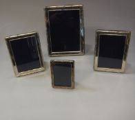 Four various modern silver photograph frames