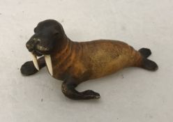 AFTER FRANZ BERGMAN "Male walrus" cold painted bronze bearing vase mark and inscribed "Austria" to