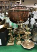 A 19th Century copper and brass samovar in the Regence style together with three pairs of brass