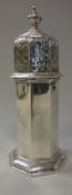 A George VI silver sugar caster of octagonal form with pierced cover (Chester 1941 maker's mark