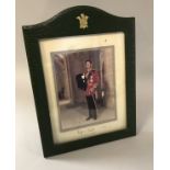 A framed and glazed photograph of Prince Charles in Military Uniform,