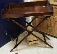 A 19th Century mahogany butlers tray with stand