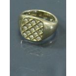 A gents 9 carat gold signet ring set with multiple diamonds 8 g