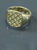 A gents 9 carat gold signet ring set with multiple diamonds 8 g