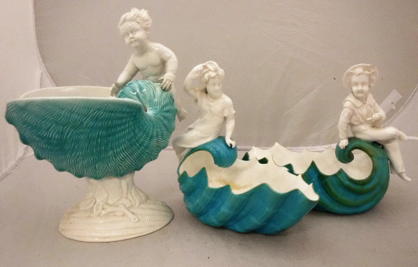 A pair of late 19th Century Derby turquoise and white glazed figural shell bowls (1877-90) and a