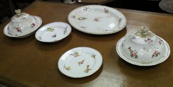 A composite floral spray decorated dinner service with blue and gilt line border including thirteen