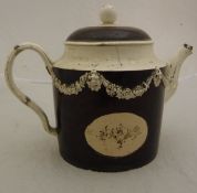 An 18th Century English creamware pottery teapot,