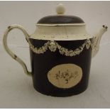 An 18th Century English creamware pottery teapot,