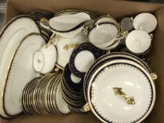 An Aynsley bone china blue and gilt decorated dinner service