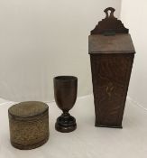 An early 19th Century oak and inlaid candle box,