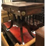 A 19th Century mahogany and inlaid card table with applied brass decoration to quadruped base