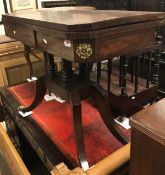 A 19th Century mahogany and inlaid card table with applied brass decoration to quadruped base