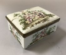A 19th Century Bilston enamelled box, the outside decorated with Cherubs,