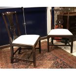 A pair of 19th Century Chippendale style dining chairs with pierced splat backs