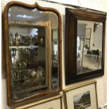 An oak cushion framed mirror together with a walnut framed miorror and a pine framed mirror