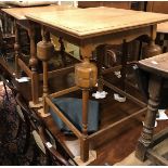 Two early 20th Century oak occasional tables in the Arts & Crafts style together with a further oak