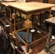 Two early 20th Century oak occasional tables in the Arts & Crafts style together with a further oak