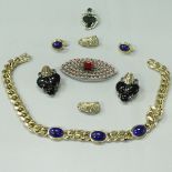 A collection of vintage costume jewellery to include Ciner earrings,