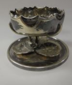 A Hukin & Heath electroplate sweetmeat dish model No 2867 modelled as a water lily flower above