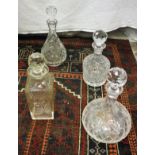 A collection of cut glass decanters to include two pairs,