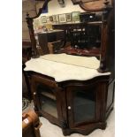 A Victorian walnut mirrored back sideboard with marble top
