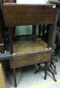 A 19th Century mahogany drop leaf Pembroke table with end drawer on square moulded supports and an