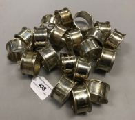 A collection of twenty modern silver napkin rings (by Theo Fennell,