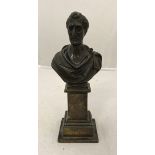 A chocolate patinated bronze bust of "The Duke of Wellington" in Roman toga as an emperor on a