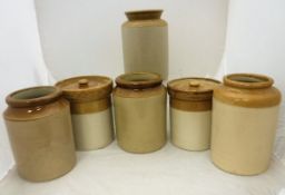 A collection of six stoneware jars,