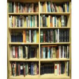A large collection of hardback books on varying subjects to incude fiction, non-fiction, religion,