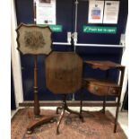 An early 19th Century mahogany pole screen with needlework floral spray panel,