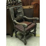 A Victorian oak elbow chair in the 17th Century manner with leather back