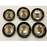 A collection of six 19th Century silhouette portraits in oval frames,