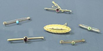 A collection of six various Victorian gold and stone set bar brooches