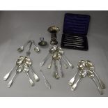 A collection of various silver wares to include four Fiddle pattern table spoons,