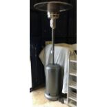 A patio gas heater together with a folding aluminium ladder