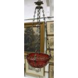 A circa 1900 ruby overlaid cut glass ceiling light shade on chain supports