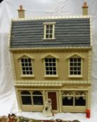 A modern painted dolls house in the Georgian style "The Brasshopper No.